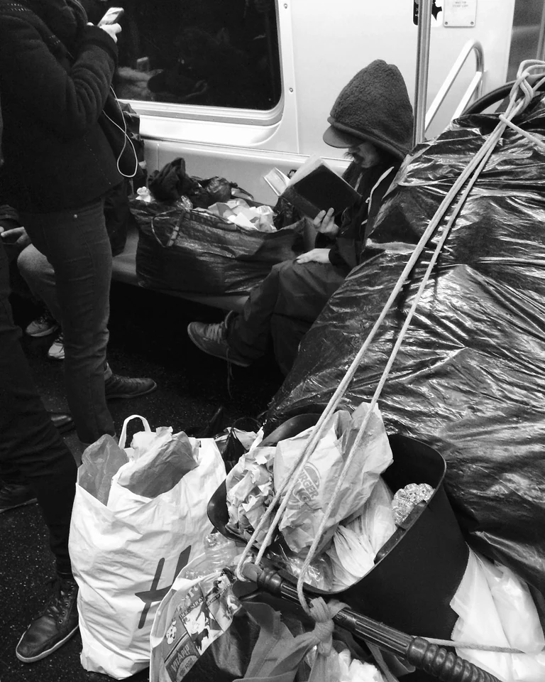 NYC nomad reading Tolstoy