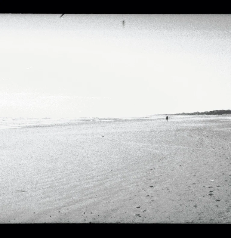 On view at The Front this Saturday & Sunday from 12 to 5 :

Christopher Givensâ photo series âTinoâs Pilgrimageâ is part of the current group exhibition Overtones of Extraction curated by Elliott Stokes ( )

To walk is to embrace simplicity, to shed the superfluous, and to confront the essence of what one is. As the noise of our lives increases, walking can be both a grounded meditation and an act of resistance against corrosive modern life.

In October of 2024, my friend Tino Park () began walking from Queens, NY towards the southernmost point of the continental United States. The 2,080-mile journey would take him 108 days. His manifesto, Migrational Pilgrimage, had three simple points:

1. I will walk on foot.
2. I will disconnect from all digital devices and media inputs except for the purpose of maps.
3. I will sleep and stay outdoors throughout the entire trip.

In these rules, he sought clarity and release from external noise. A psycho-spiritual detox. Basic movement from point A to B to C. His rhythms would be dictated by nothing but the journey. He had a sleeping bag but no tent and it was hard to sleep on nights when it froze or rained. He read Carl Saganâs Cosmos and wrote in a journal. He moved through highway shoulders, pinewoods, empty beaches, parking lots, across ditches, encountered vivid figures in his dreams, saw numberless dead animals, met strangers of all kinds, and walked by himself all day long.

Tino chose to engage with the world at a human pace. The physical labor of walking aligns with the spiritual labor of transforming oneself via a process. Walking between worlds of exterior and interior, real and imagined, the pilgrim is a bridge across which revelations might occur. Their migration inevitably leading to the core questions of any lifetime such as what of me is actually mine, or, more simply who am i now ?

Artist bio:
Christopher Givens was born in Monroe, Louisiana. He studied film at UNO in the first years after Katrina. Since 2020, he has been developingÂ The ABC Triptych ( ) a set of 3 feature films exploring synchronicity, perception, and spiritual transformation.